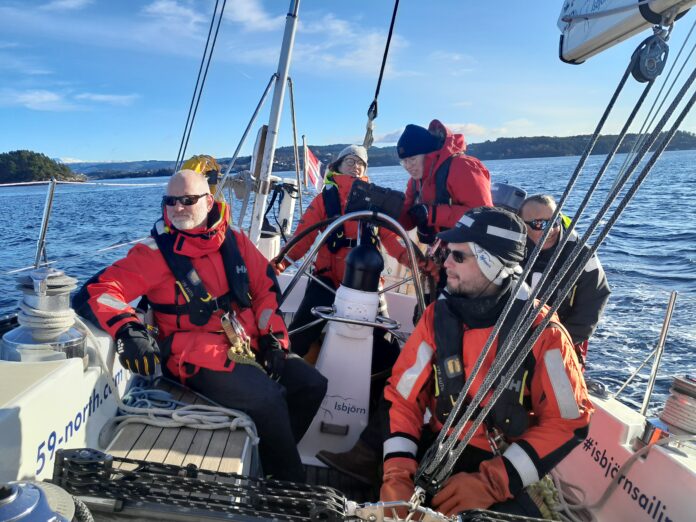 The crew on Isbjørn tacking the final stretch in to Bergen in perfect conditions.